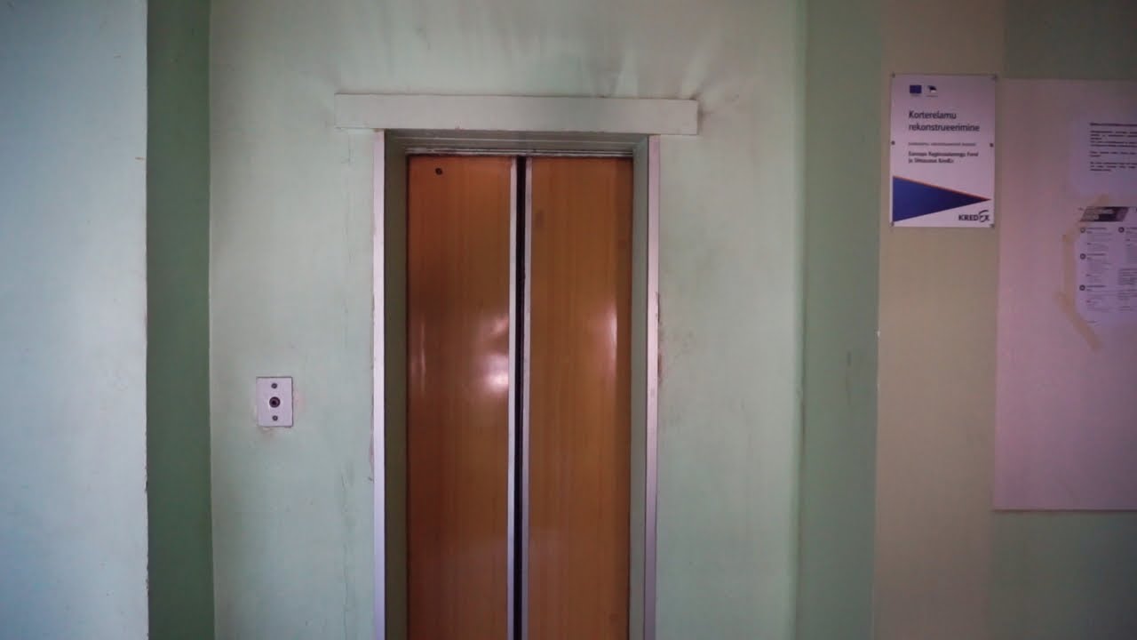 Technician repairing an elevator